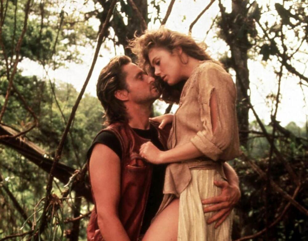 Majkl Daglas i Ketlin Tarner u filmu 'Lov na zeleni dijamant' (1984)