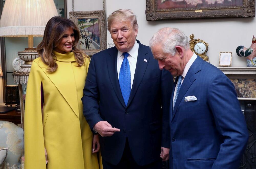 Melanija i Donald Tramp tokom razgovora s kraljem Čarlsom III, tada princem od Velsa, prilikom prijema u Klarens hausu  2019.