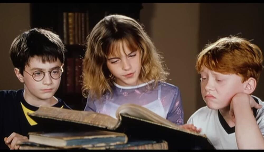 Danijel Redklif, Ema Votson i Rupert Grint u filmu 'Hari Poter i kamen mudrosti'