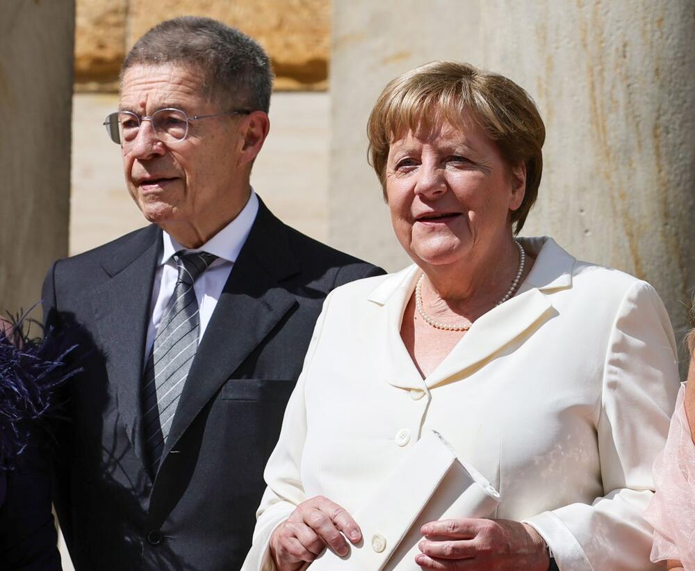 Joakim Sojer i Angela Merkel