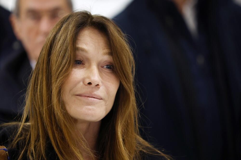 Nikola Sarkozi i Karla Bruni nakon izricanja presude u Parizu