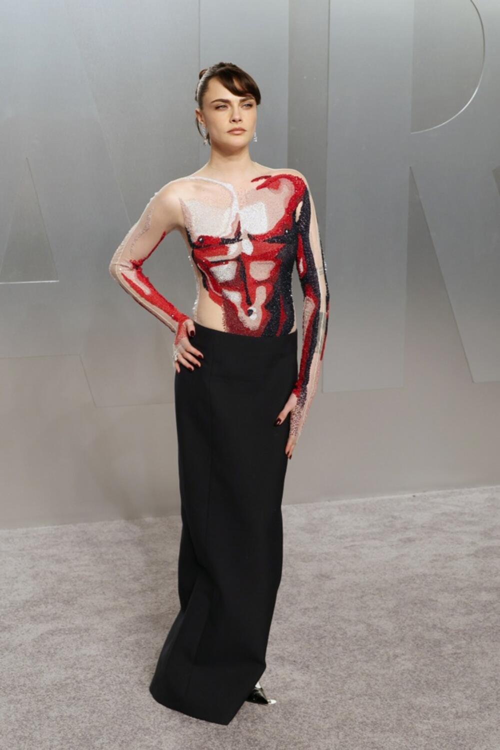 Kara Delevinj na žurki časopisa Vanity Fair posle 98. dodele Oskara